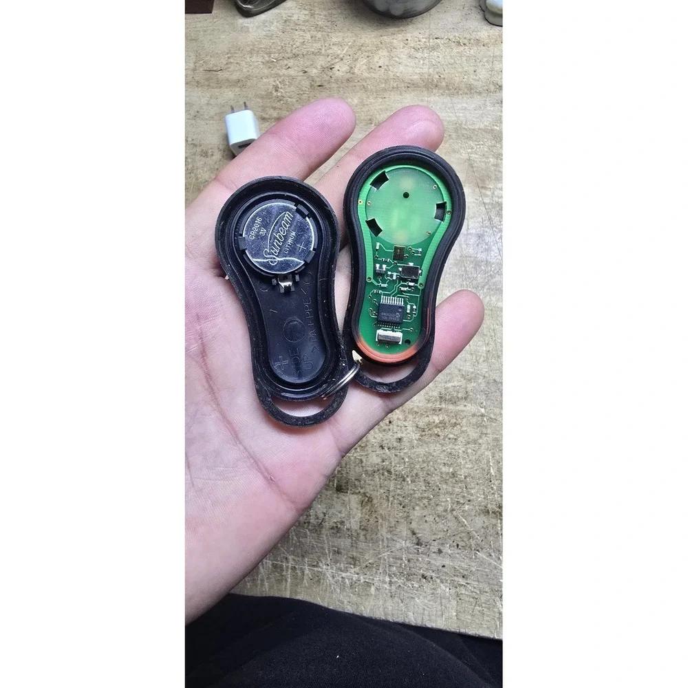 TRW keyless entry remote fob for Jeep vehicles 1999-2004 Jeep Grand Cherokee.